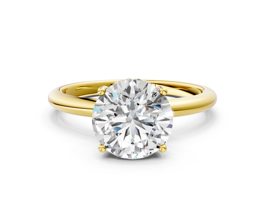 Yellow gold Round Cut Solitaire Engagement Ring with Four-Prong Setting and Classic Band