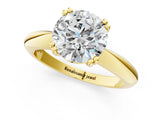 Yellow gold Round Cut Solitaire Engagement Ring with Tapered Band and Four-Prong Setting 1