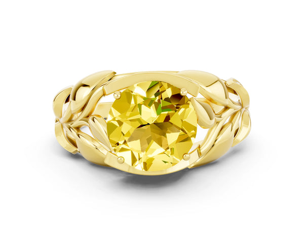 Yellow gold Round Cut Yellow Sapphire Leaf-Inspired Engagement Ring with Round Accents and Prong Setting