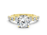 Yellow gold Round Cut Solitaire Moissanite Ring with Pave Band and Four-Prong Setting