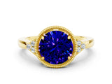 Yellow gold Round Cut Tanzanite Halo Ring with Tapered Band and Four-Prong Setting