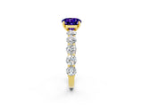 Yellow gold Round Cut Tanzanite Prong Setting with Side Stones on a Pave Band_2