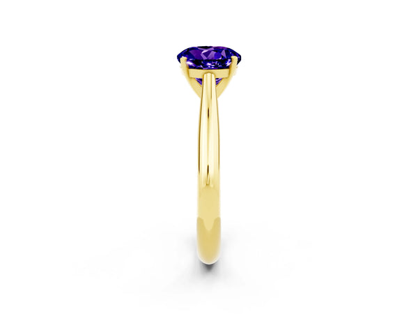 Yellow gold Round Cut Tanzanite Solitaire Engagement Ring with Cathedral Setting and Four-Prong Mount