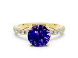 Yellow gold Round Cut Tanzanite Solitaire Pavé Band with Four-Prong Setting