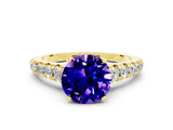 Yellow gold Round Cut Tanzanite Solitaire Ring with Cathedral Setting and Pavé Band