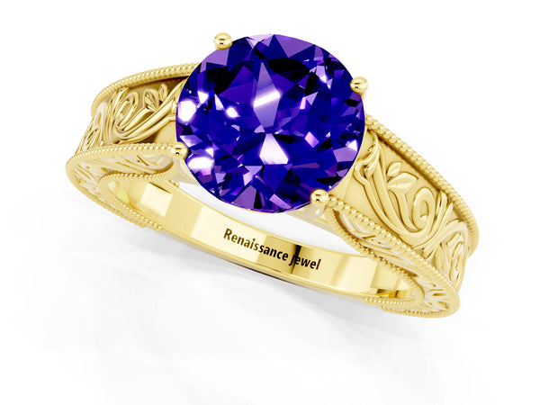 Yellow gold Round Cut Tanzanite Solitaire Ring with Engraved Band and Four-Prong Setting