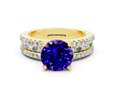 Yellow gold Round Cut Tanzanite Solitaire Ring with Pavé and Channel Set Band