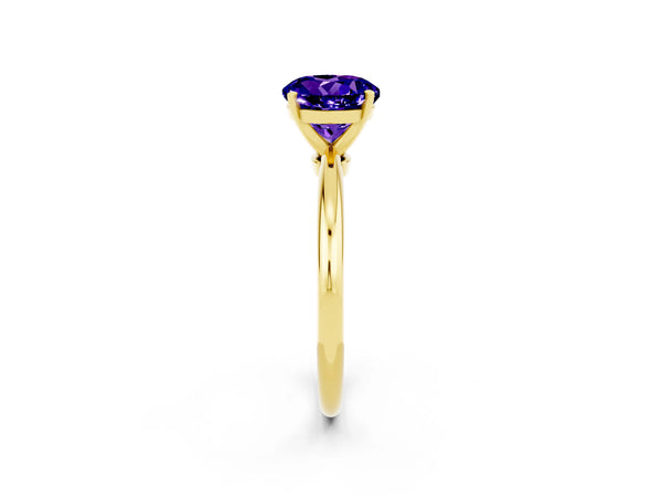 Yellow gold Round Cut Tanzanite Solitaire Ring with Six-Prong Setting and Classic Band