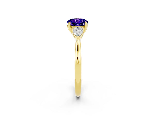 Yellow gold Round Cut Tanzanite Three-Stone Ring with Pear  Side Stones and Prong Setting