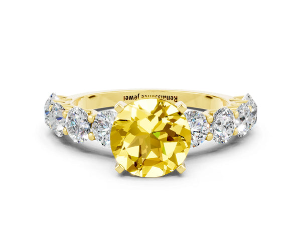 Yellow gold Round Cut Yellow Sapphire Prong Setting with Side Stones on a Pave Band