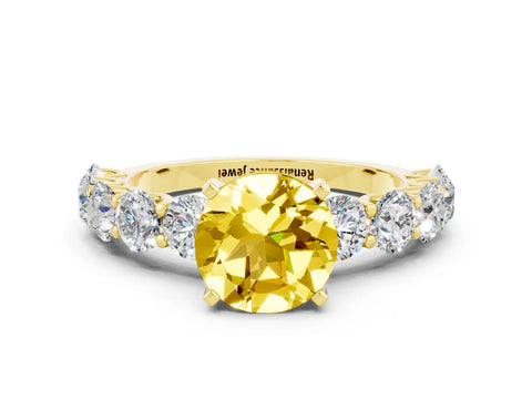 Yellow gold Round Cut Yellow Sapphire Prong Setting with Side Stones on a Pave Band_24