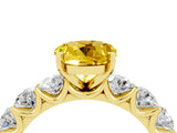 Yellow gold Round Cut Yellow Sapphire Prong Setting with Side Stones on a Pave Band_28