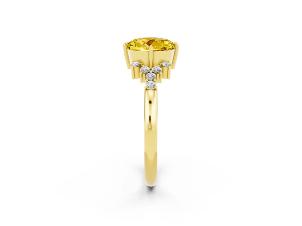 Yellow gold Round Cut Yellow Sapphire Ring with Side Stones and Four-Prong Setting