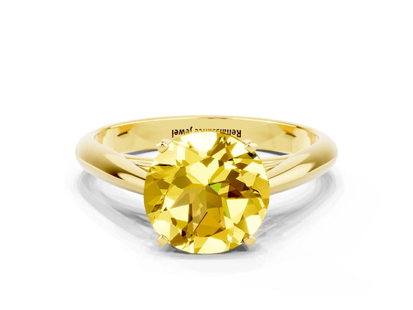 Yellow gold Round Cut Yellow Sapphire Solitaire Engagement Ring with Cathedral Setting and Four-Prong Mount