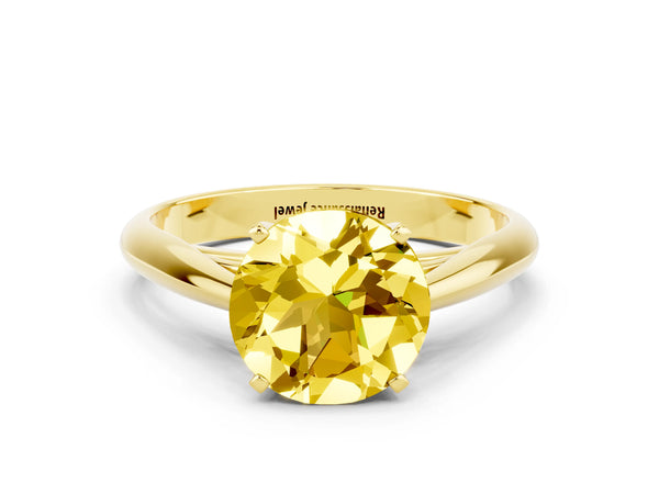 Yellow gold Round Cut Yellow Sapphire Solitaire Engagement Ring with Cathedral Setting and Four-Prong Mount