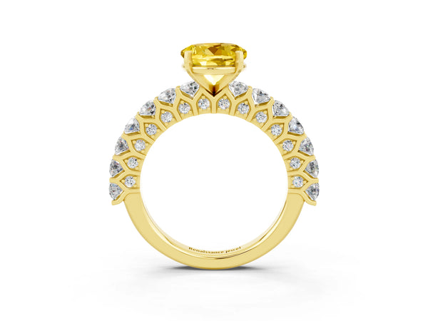 Yellow gold Round Cut Yellow Sapphire Solitaire Ring with Shared Prong Pavé Band and Four-Prong Setting
