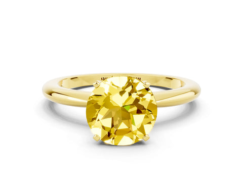 Yellow gold Round Cut Yellow Sapphire Solitaire Ring with Six-Prong Setting and Classic Band