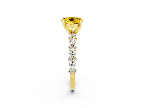 Yellow gold Round Cut Yellow Sapphire Side Stone Solitaire Ring with Round  and Four-Prong Setting