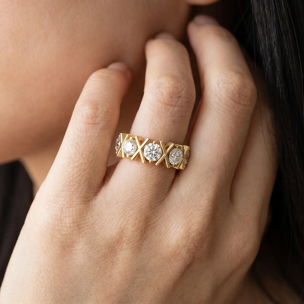 Yellow gold Round Diamond Channel Set Band with X-Prong Detail