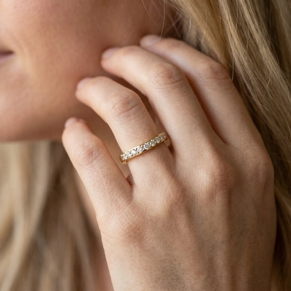 Yellow gold Round Diamond Curved Wedding Band with Channel Setting