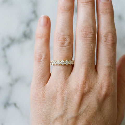 14K Yellow Gold Round Diamond Eternity Band with Pavé Setting and Shared Prong