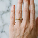14K Yellow Gold Round Diamond Eternity Band with Pavé Setting and Shared Prong