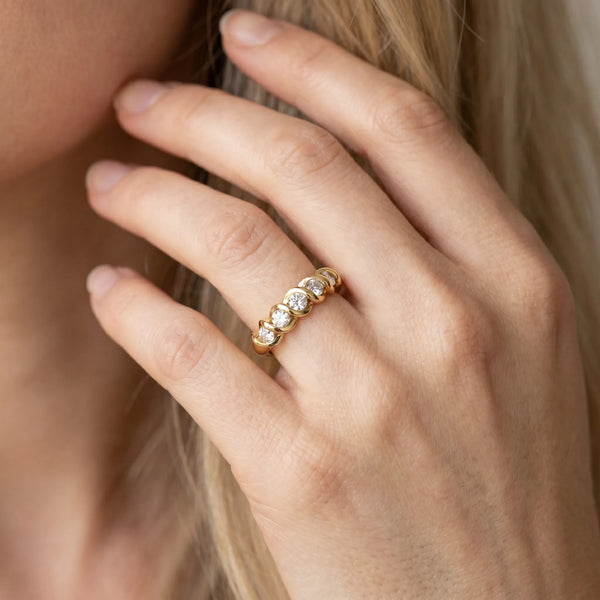 Yellow gold Round Diamond Eternity Band with Twist Prong Setting
