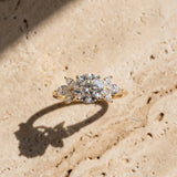 Yellow gold Round Diamond Floral Cluster Ring with Marquise Side Stones and Six-Prong Solitaire Setting_10