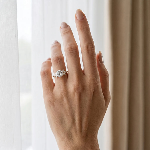 Yellow gold Round Diamond Floral Cluster Ring with Marquise Side Stones and Six-Prong Solitaire Setting
