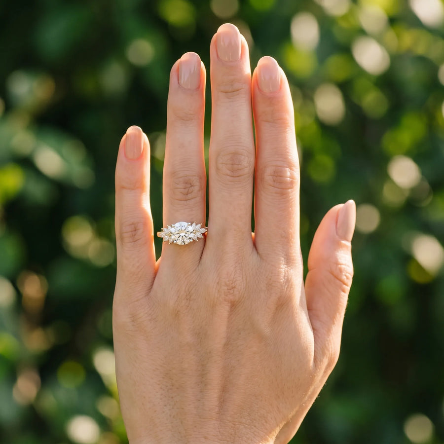 Yellow gold Round Diamond Floral Side Stone Solitaire with Marquise Accents and Four-Prong Setting