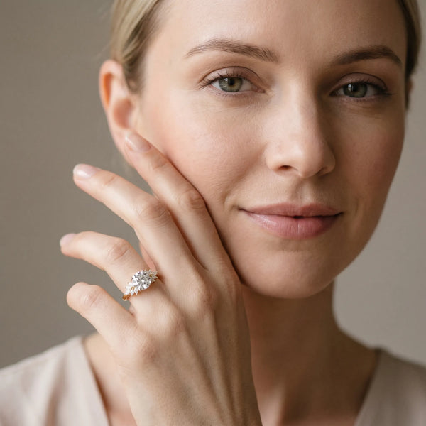 Yellow gold Round Diamond Floral Side Stone Solitaire with Marquise Accents and Four-Prong Setting