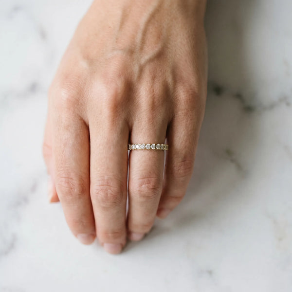 Yellow gold Round Diamond Pavé Set Eternity Band with Micro Prong Setting