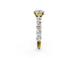 Yellow gold Round Diamond Prong Setting with Side Stones on a Pave Band_137