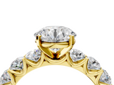 Yellow gold Round Diamond Prong Setting with Side Stones on a Pave Band_139