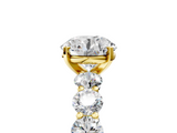 Yellow gold Round Diamond Prong Setting with Side Stones on a Pave Band_140