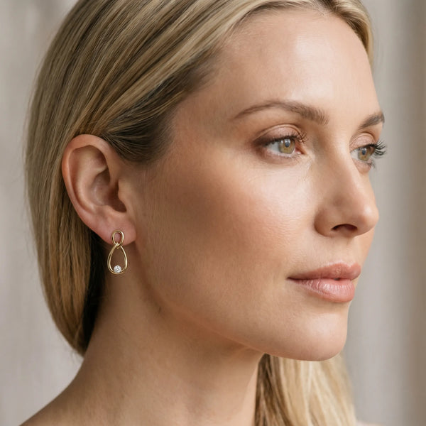 Yellow gold Round Diamond Teardrop Earrings with Bezel Setting and Loop Band