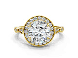 Yellow gold Round Halo Diamond Engagement Ring with Twisted Band and Four-Prong Setting
