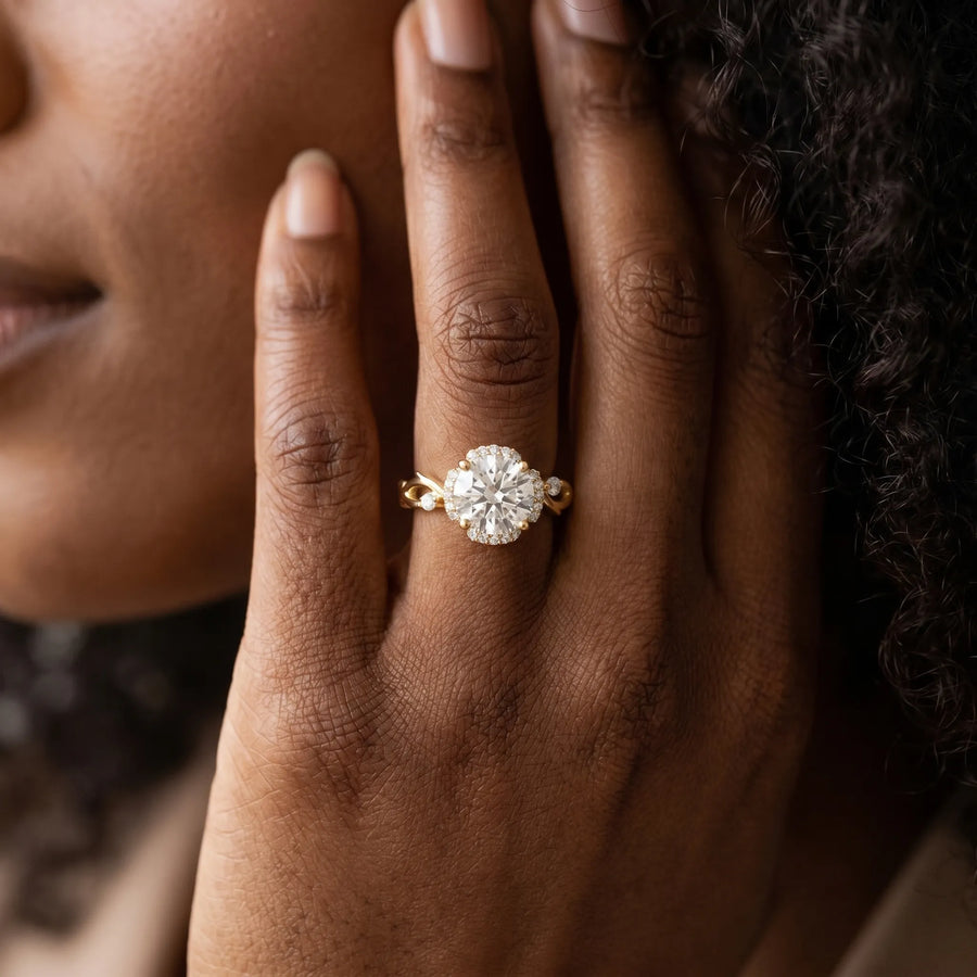 Yellow gold Round Halo Solitaire Diamond Ring with Twisted Band and Four-Prong Setting
