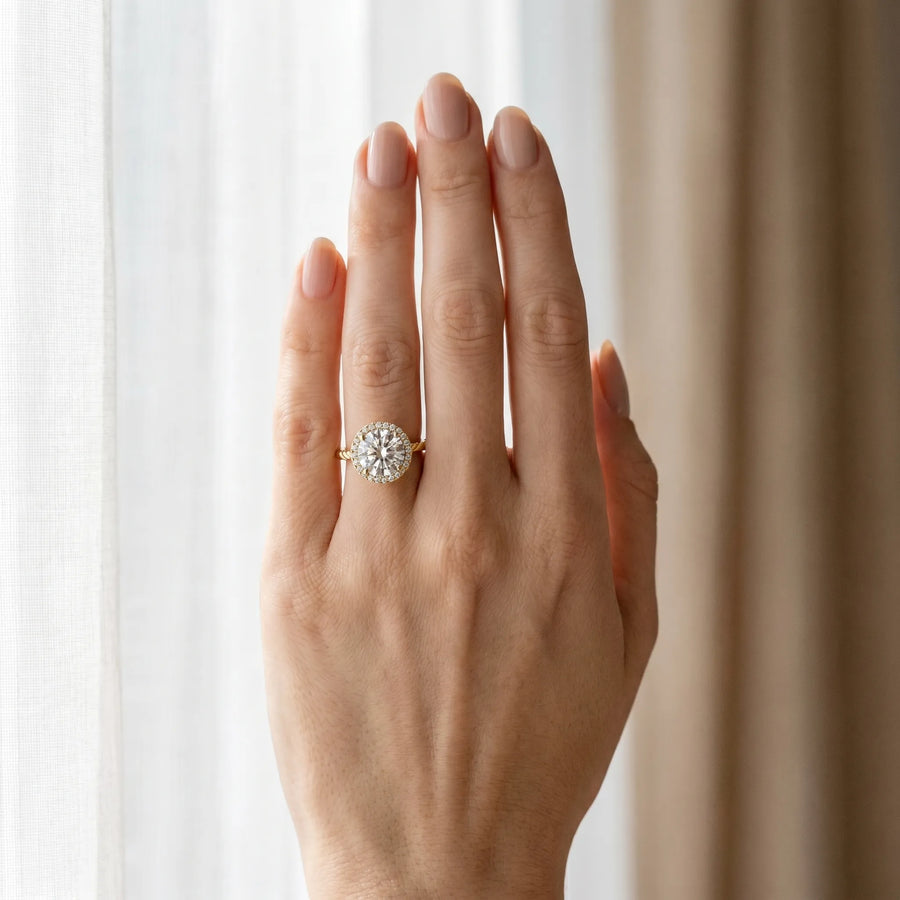 Yellow gold Round Halo Twisted Band Four-Prong Diamond Ring