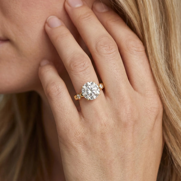 Yellow gold Round Solitaire Bezel-Set Diamond Ring with Beaded Band and Four-Prong Setting