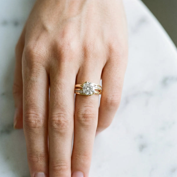 18K Yellow Gold 2.02 Carat D VS1 Oval Solitaire Channel-Set Split Shank Ring with Tension Prong Setting