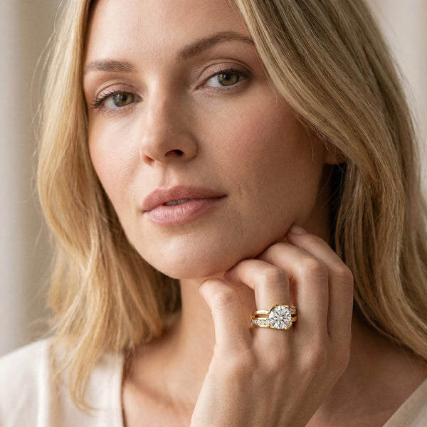 Yellow gold Round Solitaire Channel-Set Split Shank Ring with Tension Prong Setting