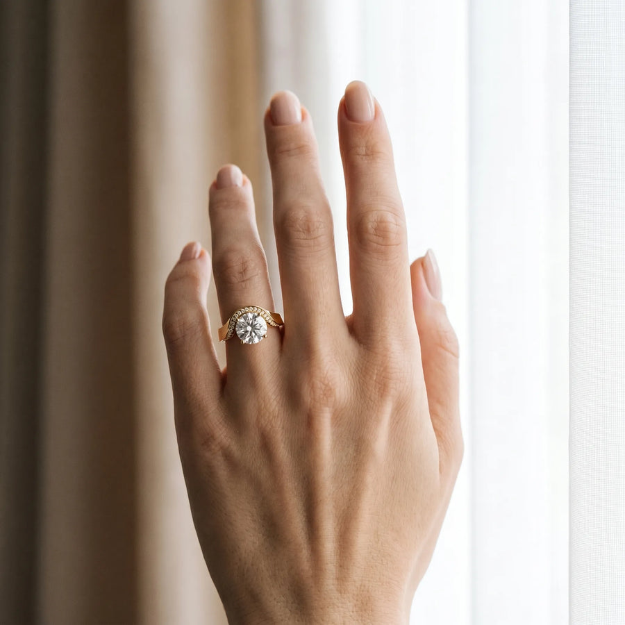 Yellow gold Round Solitaire Diamond Engagement Ring with Pave Band and Four-Prong Setting