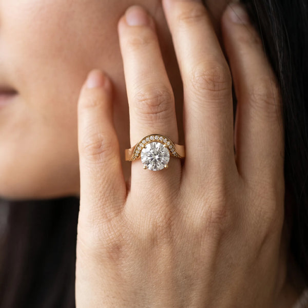 Yellow gold Round Solitaire Diamond Engagement Ring with Pave Band and Four-Prong Setting