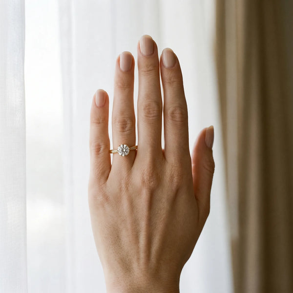 Yellow gold Round Solitaire Diamond Engagement Ring with Split Shank and Six-Prong Setting