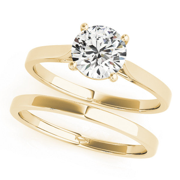 Yellow gold Round Solitaire Diamond Ring with Four-Prong Setting and Tapered Band 1