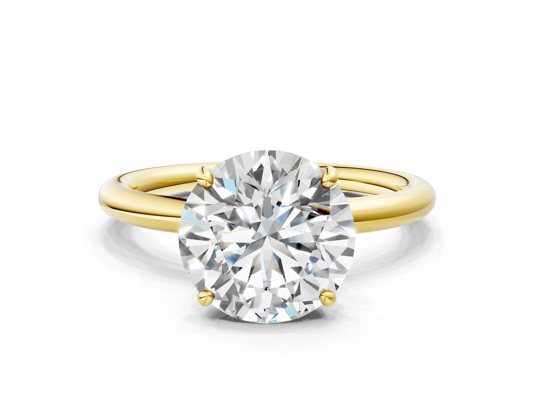 Yellow gold Round Solitaire Diamond Ring with Four-Prong Setting on a Plain Band_40