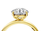 Yellow gold Round Solitaire Diamond Ring with Four-Prong Setting on a Plain Band_44