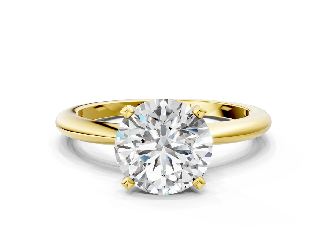 Yellow gold Round Solitaire Diamond Ring with Six-Prong Setting on a Classic Band