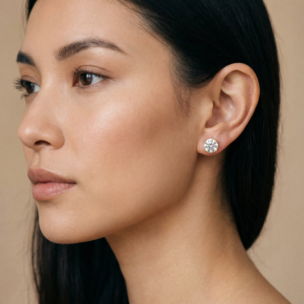 Yellow gold Round Solitaire Diamond Stud Earrings with Four-Prong Basket Setting